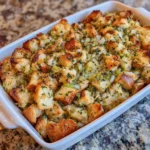 Spoonful of golden stuffing with crisp top and soft center