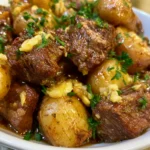 slow cooker garlic butter beef bites with potatoes